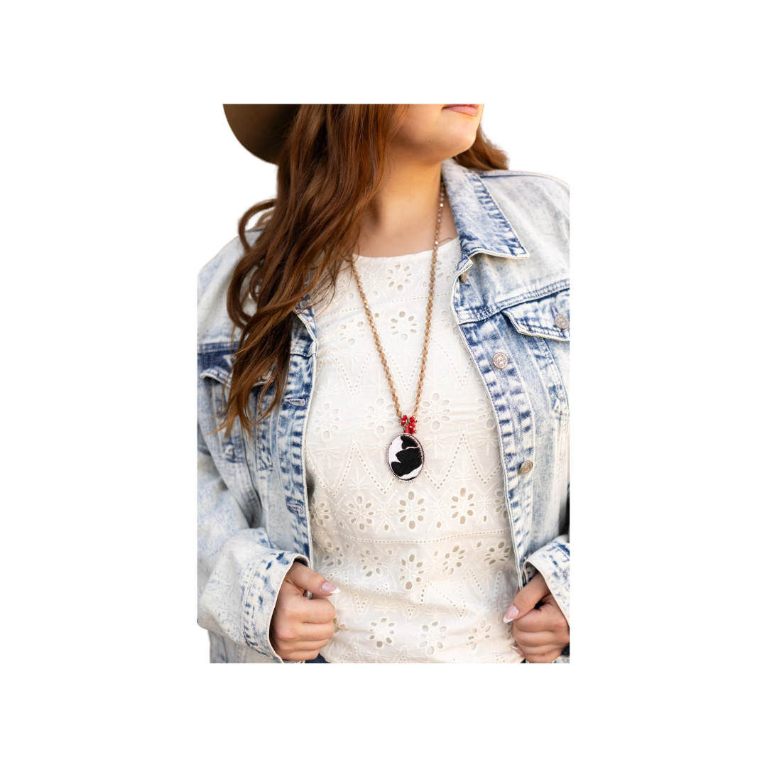 Southern Grace Women's Dazzling Winter Nights In A Clear Cowhide Oval Pendant Necklace